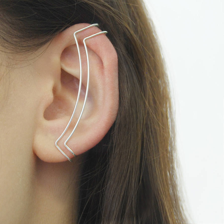 Otis Jaxon crée des boucles d'oreilles jouant avec de petites illusions d'optique