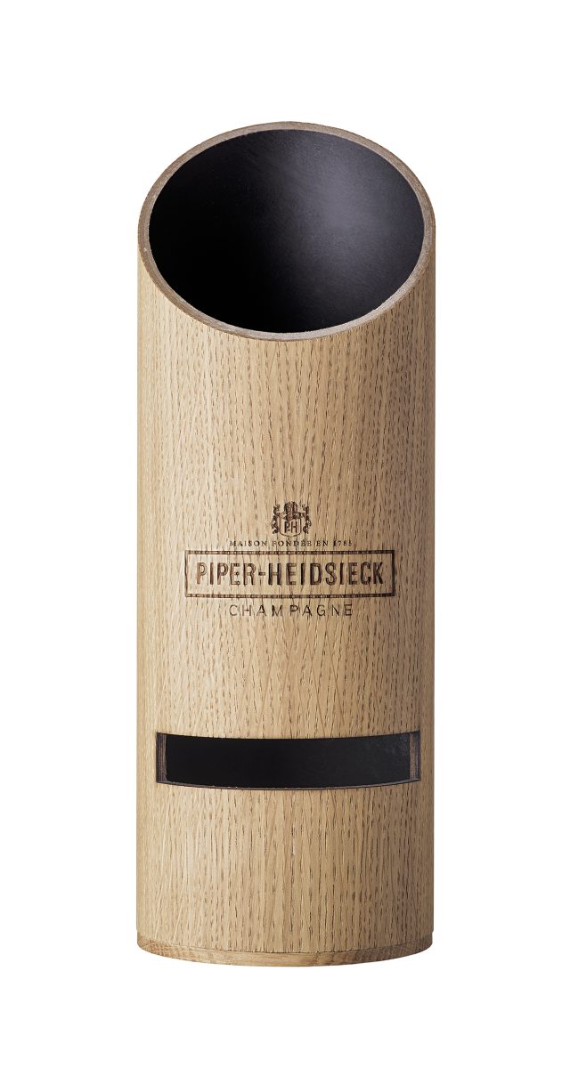 Ce packaging de champagne en bois fait office d'enceinte pour vos pique